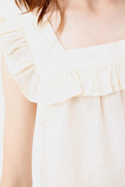 Top with ruffle detail